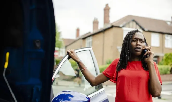 Woman calling for breakdown assistance